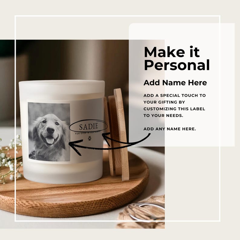 May include: A white candle with a black and white photo of a dog on the label. The candle is on a wooden tray with a wooden lid. Text on the label says "SADIE" and "FUR EVER IN OUR HEARTS". The text "Make it Personal" is also visible.