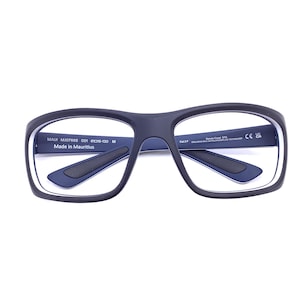 May include: Rectangular sunglasses with a matte black frame and dark blue interior accents. The inner temple features the text MAUI MJ0766S 001 61-19-130 M and Made in Mauritius. The lenses are clear, and the frame has a smooth, solid construction.