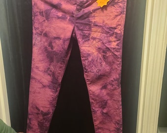 Purple tie die jeggings.  size 8 with waist size 29.  Has multiple different purple colors.  Very stretchy and comfortable
