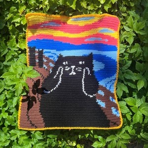 かぎ針編みの猫のタペストリーのパターン