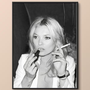 trazodone and smoking cigarettes Kate Moss a cigarette out of the window of an opera theatre as Pete Doherty plays guitar for fans below KATE MOSS AND JOHN GALLIANO