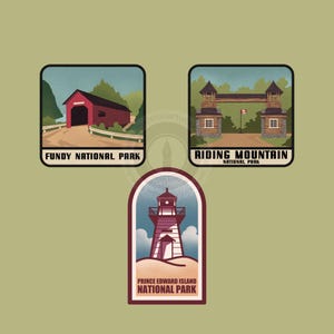 May include: Three vintage-style travel stickers featuring Canadian National Parks. The stickers include a red covered bridge, a wooden gate, and a lighthouse. The text on the stickers reads "Fundy National Park", "Riding Mountain National Park", and "Prince Edward Island National Park".