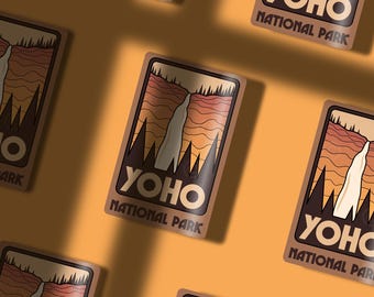 May include: A set of six brown and white stickers with a retro design featuring a waterfall and the text "Yoho National Park".