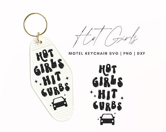 May include: A white motel-style keychain with the text "HOT GIRLS HIT CURBS" in black, along with a car graphic. The keychain has a gold-colored ring and a matching design on the right side.