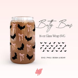 May include: A 16 ounce glass wrap SVG design featuring a pattern of black bats with pink bows. The design is titled "Batty Bows" and includes the text "SVG | PNG | BOBA & BEAR".