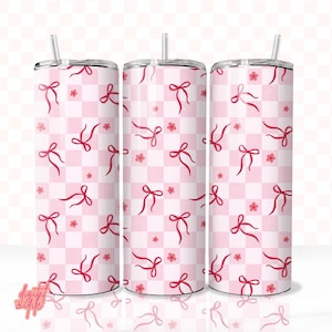 May include: Three stainless steel tumblers with pink and white checkered pattern and red bows.