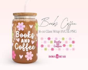 May include: A 16 ounce glass wrap design featuring a brown glass tumbler with a straw, a wooden lid, and a pink and green floral pattern. The tumbler has the text "Books and Coffee" printed on it. The design also includes a pattern of pink, green, and white flowers. The text "Books Coffee" is written in a cursive font at the top of the design. The text "BOBA & BEAR" is written in a black font at the bottom of the design.