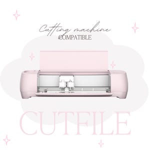 May include: A light pink electronic cutting machine with an open lid and a central carriage mechanism. The text "Cutting machine COMPATIBLE" appears above the device, and the word "CUTFILE" is printed in large, light pink letters below it.