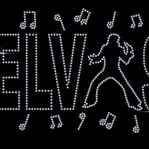 May include: A rhinestone design of the word "ELVIS" with a silhouette of Elvis Presley performing on stage. The design includes musical notes.