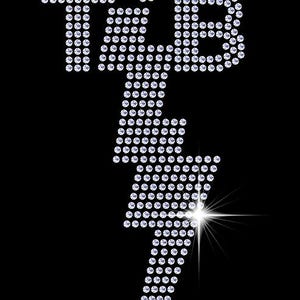 May include: A lightning bolt design made of sparkling rhinestones. The word "STAR" is above the lightning bolt.