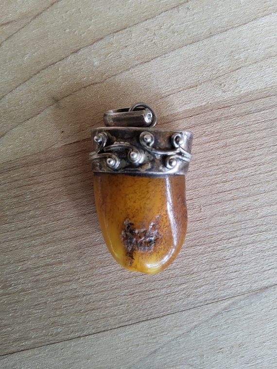 Antique sterling silver amber pendant