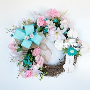 He is Risen Easter grapevine wreath for your home decor or front door this spring. Celebrate the religious holiday with this Easter wreath.