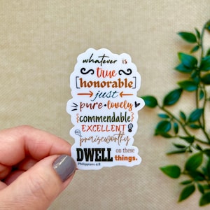 May include: A white sticker with a colorful design and the text "whatever is true honorable just pure lovely commendable excellent praiseworthy dwell on these things. Philippians 4:8"