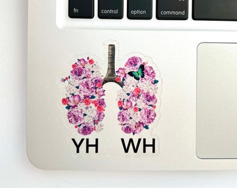 May include: A sticker of a pair of lungs with pink and white flowers and a butterfly. The text "YH WH" is below the lungs.