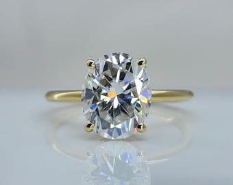 Anillo de compromiso ovalado con diamante sintético de 2 quilates, halo oculto, certificado por IGI.