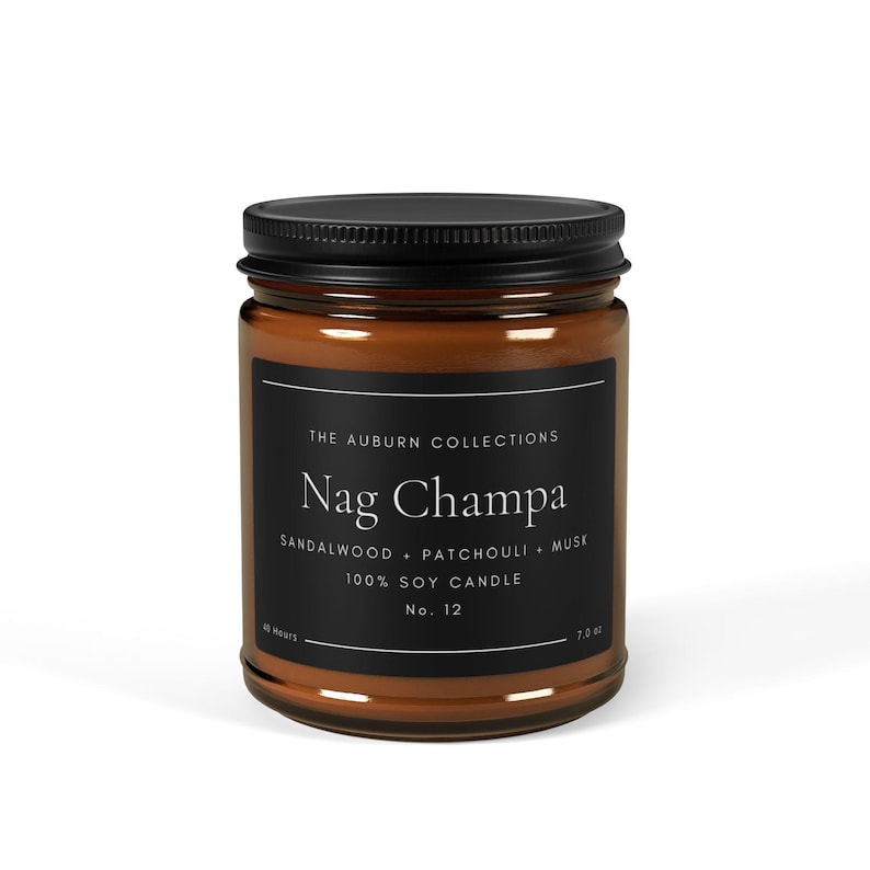 May include: A Nag Champa scented soy candle in a clear glass jar with a black lid. The label reads "Nag Champa" with "Sandalwood + Patchouli + Musk" and "100% Soy Candle". The candle is No. 12 and has a 7.0 oz volume.