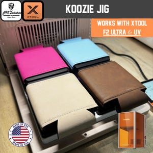 May include: A Koozie Jig for xTool F2 Ultra and UV machines, featuring four beverage sleeves in pink, light blue, cream, and brown. The text reads Koozie Jig and Works with xTool F2 Ultra and UV. Includes a Made in USA logo and a small xTool machine graphic.