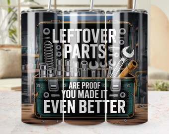 May include: A stainless steel tumbler with a design featuring a toolbox filled with tools and the text "LEFTOVER PARTS ARE PROOF YOU MADE IT EVEN BETTER". The design is in shades of green, black, and white.