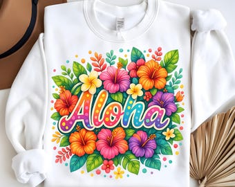 May include: White sweatshirt with a colorful floral design and the word "Aloha" in a rainbow font. The flowers are pink, orange, purple, and yellow.