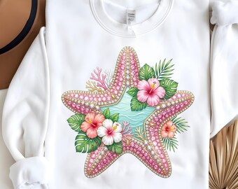 May include: White sweatshirt featuring a large, pink starfish design. The starfish is adorned with gemstones and surrounded by tropical flowers, coral, and green leaves. The design has a light blue center, creating a vibrant, beachy theme.