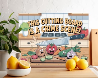 May include: A humorous cutting board with the text "THIS CUTTING BOARD IS A CRIME SCENE!" features cartoon vegetables and a knife. The vegetables include a tomato, onion, carrot, cucumber, and garlic. A bowl of lemons sits in front of the cutting board.