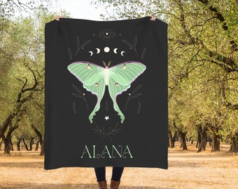 May include: Black throw blanket with a green luna moth design, a crescent moon, and the name "ALANA" printed in white.
