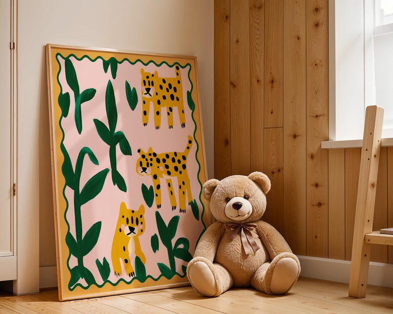 May include: A framed print with a pink background and green leaves. Three yellow and black leopards are depicted in the print. The print is hanging on a wall next to a wooden ladder.