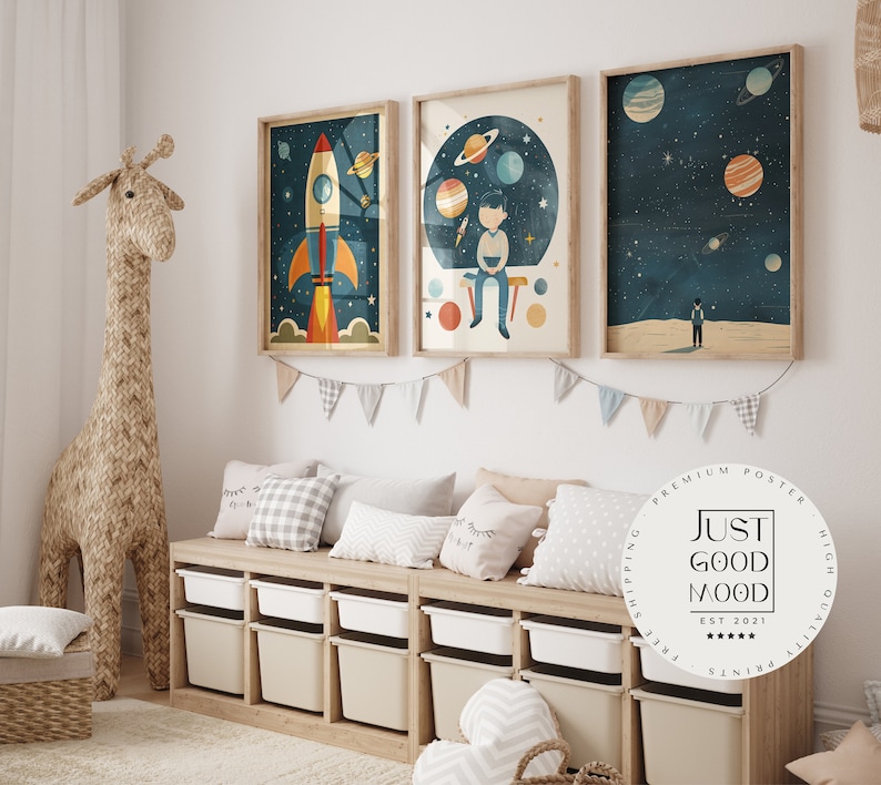 May include: Three framed illustrations of space-themed scenes. The first shows a rocket ship flying through space. The second shows a boy sitting on a planet with other planets in the background. The third shows a person standing on a planet with stars in the background. The illustrations are in a modern style with bright colors and simple lines.