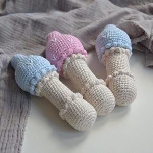 Charming crochet baby rattle mushroom