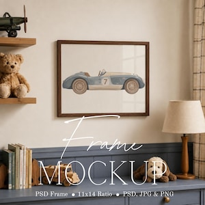 May include: A rectangular wooden frame containing a print of a vintage blue race car with the number 7 on its side. The frame is displayed on a wall above a blue shelf featuring a wooden toy truck, a plush dog, and a row of books.