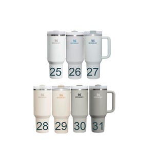a collection of white and gray stainless steel tumblers with the brand name "STANLEY" printed on them. The tumblers are arranged in two rows, with the top row containing four tumblers and the bottom row containing five tumblers. Each tumbler has a number printed on it, ranging from 25 to 31, indicating the size or capacity of the tumbler.
