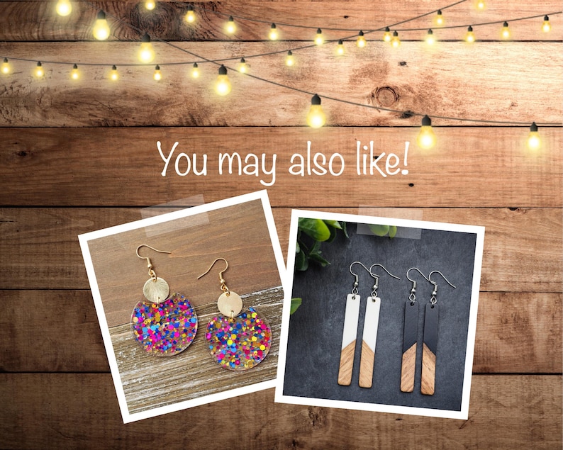 May include: Two pairs of earrings. The first pair features a gold circle with a colourful confetti design. The second pair features a long, rectangular wooden design with black and white paint.