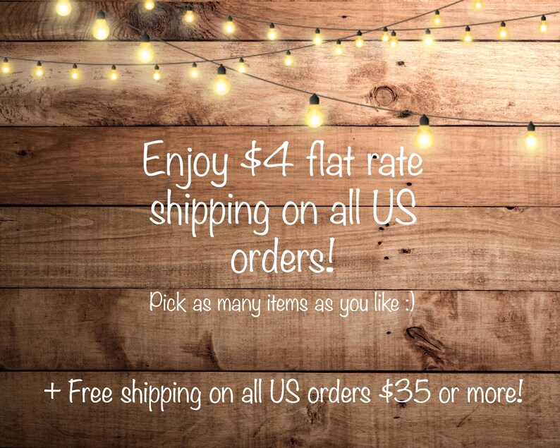 May include: A rustic wooden background with a string of white lights. Text reads: "Enjoy &pound;4 flat rate shipping on all UK orders! Pick as many items as you like :) + Free shipping on all UK orders &pound;35 or more!"