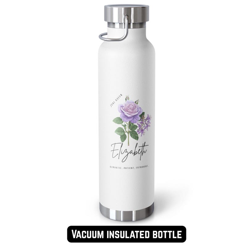 May include: White vacuum insulated bottle with a silver lid and handle. The bottle features a floral design with a purple rose and the name "Elizabeth" in script. The text "VACUUM INSULATED BOTTLE" is printed at the bottom.