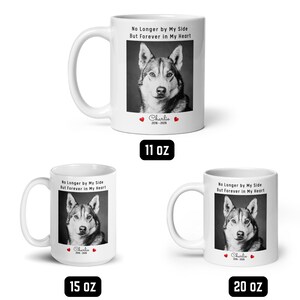 May include: White ceramic mugs with a black and white image of a dog, the text "No Longer by My Side But Forever in My Heart", and the name "Charlie" with dates. Available in 11 oz, 15 oz, and 20 oz sizes.