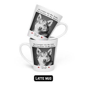 May include: Two white latte mugs stacked, each featuring a black and white photo of a dog. The mugs have the text "No Longer by My Side But Forever in My Heart" and the name "Charlie" with dates. The bottom mug has the text "LATTE MUG".