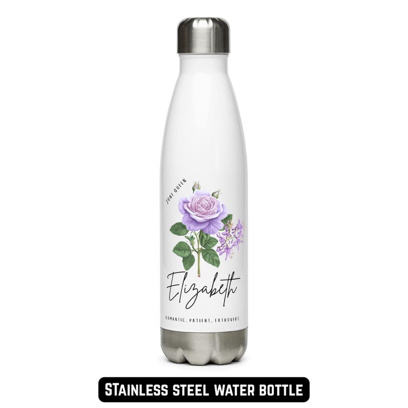 May include: White stainless steel water bottle with a silver cap and base. The bottle features a purple rose and lilac floral design with the name "Elizabeth" in script. Text at the bottom reads "Romantic, Patient, Extrovert."
