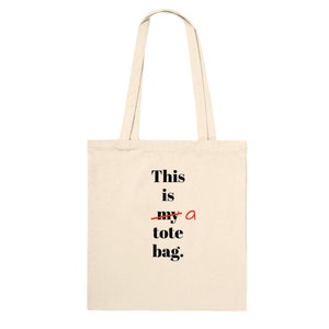This is a Tote Bag- Eco-Friendly Cotton Canvas Bag With Bold Slogan, Classic Tote Bag - Premium Tote Bag, Reusable Bag