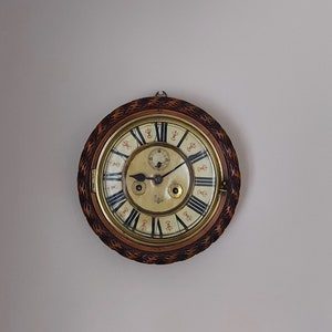 Antique New haven carved oak hair spring balance clock