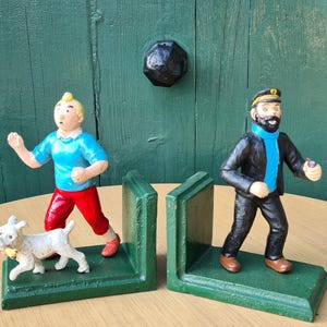 Vintage style tintin snowy bookends