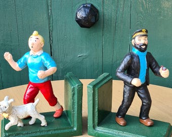 Podpórki do książek w stylu vintage z Tintinem i śnieżnym motywem