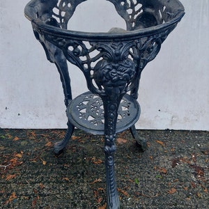 Old heavy cast iron patio table/old pub table/decorative cast iron table