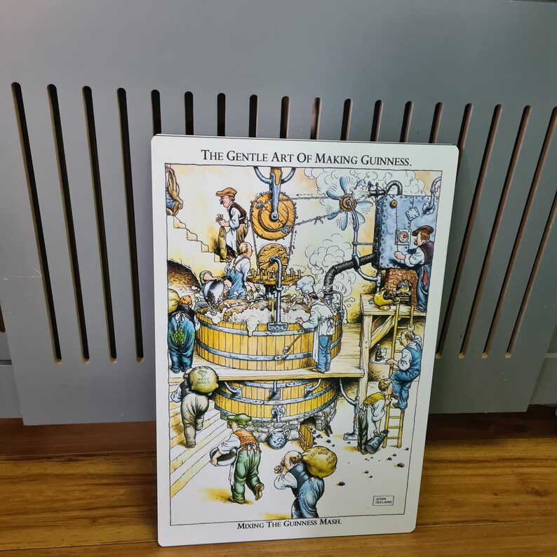 May include: A vintage illustration depicting the process of making Guinness beer. The image shows a cartoon-style factory with workers and a large vat labeled "Mixing the Guinness Mash". The text "The Gentle Art of Making Guinness" is at the top of the image.