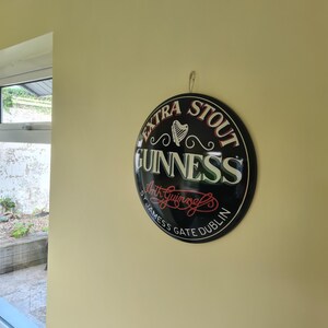 Pair of Guinness domed tin wall signs image 7