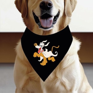 May include: A black dog bandana featuring a cartoon Pluto design. The Pluto character is depicted in tan, white, and red colors. The bandana is triangular and is worn by a golden retriever.