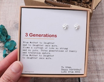 May include: A small white gift box with a silver flower earring set inside. The box has a white card with the text "3 Generations" and a poem about family and tradition. The card also includes the text "To Gran, Happy birthday! Love from Abbi."