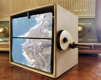 Travel memories: Personalized memory box as a flip book picture frame to crank