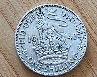 1940 silver shilling English version. Exremely Fine AU58 grade. Sealed capsule and hologram. UK Coin Hunters.