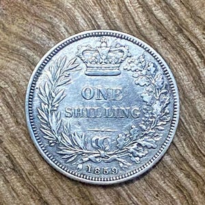 1859 Silver Shilling, Victoria.  Fine & Scarce. Sealed Capsule with hologram seal. UK Coin Hunter.