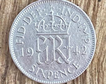 1942 Silver Sixpence VG20 grade. Good Condition. Sealed Capsule. UK coin Hunt.